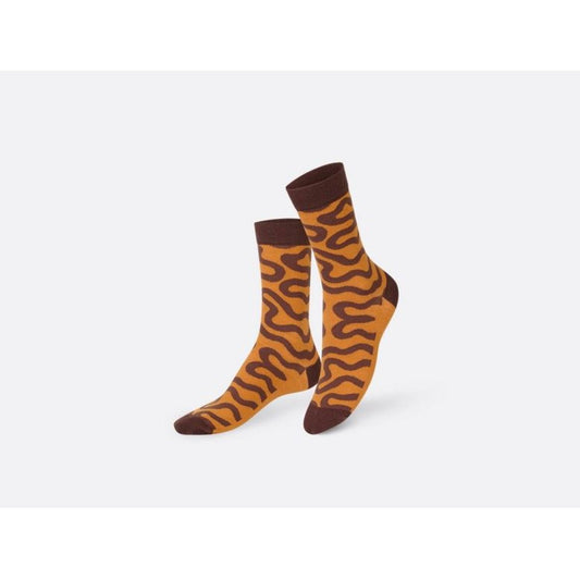 Chaussettes Eat My Socks – modèle Éclair au chocolat, packaging pâtisserie