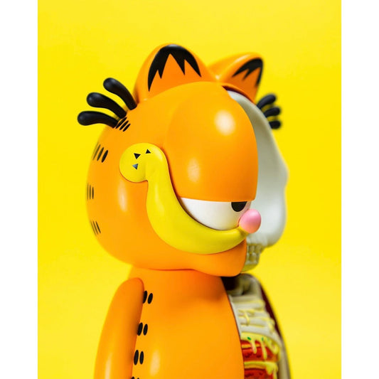 Figurine XXRAY Plus Garfield moitié cartoon, moitié coupe anatomique, avec squelette et lasagnes visibles