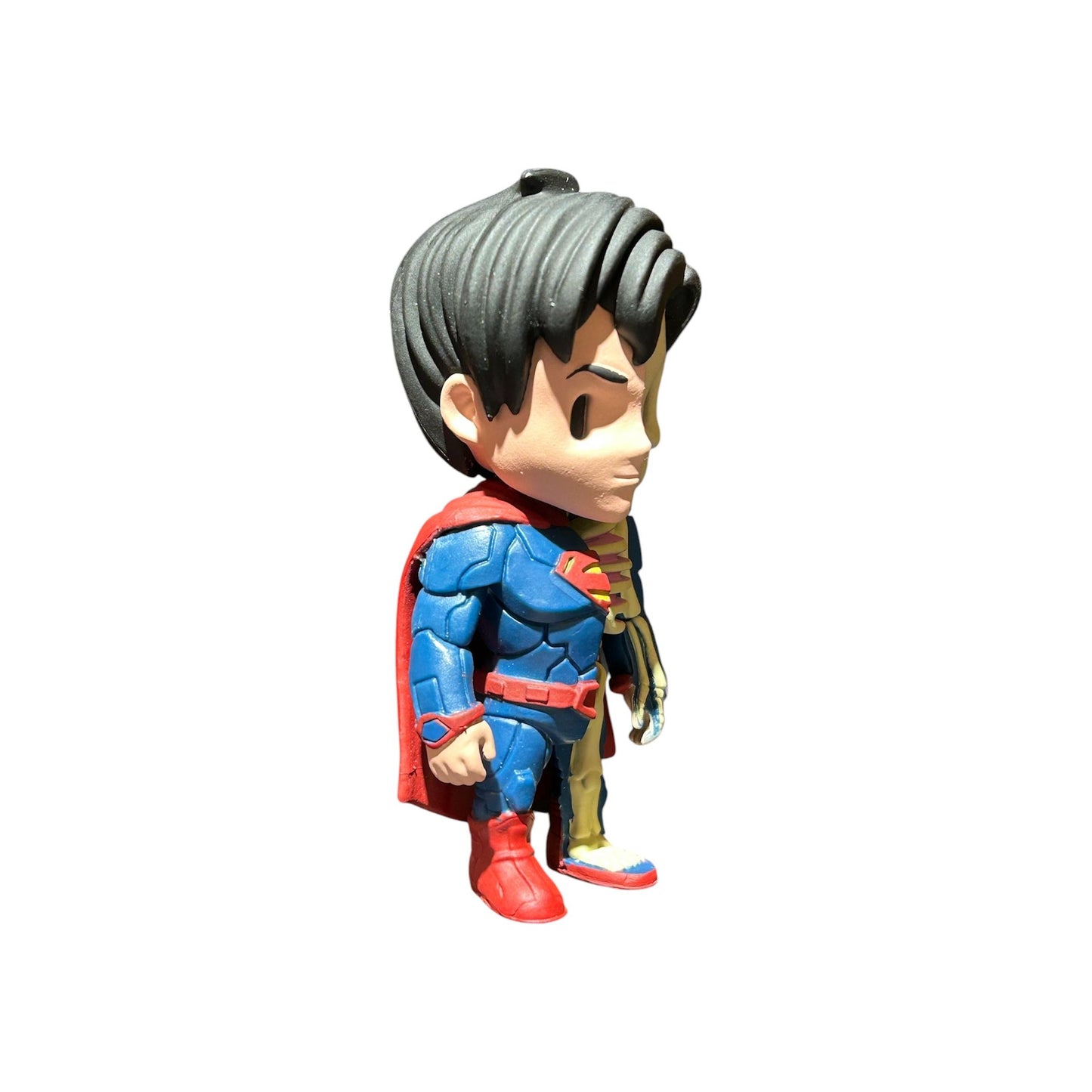 Figurine XXRAY Superman moitié super-héros classique, moitié squelette anatomique détaillé