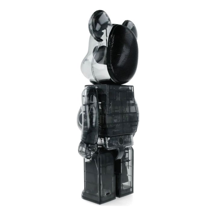 Enceinte Bluetooth Be@rbrick 400% x Rinaro au design transparent futuriste, avec haut-parleur intégré