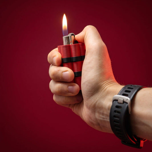 Briquet Dynamite Superstuff rouge et noir au design fantaisie avec anneau métallique