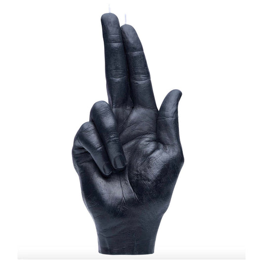 Bougie noire Candlehand en forme de main faisant le geste "gun fingers"