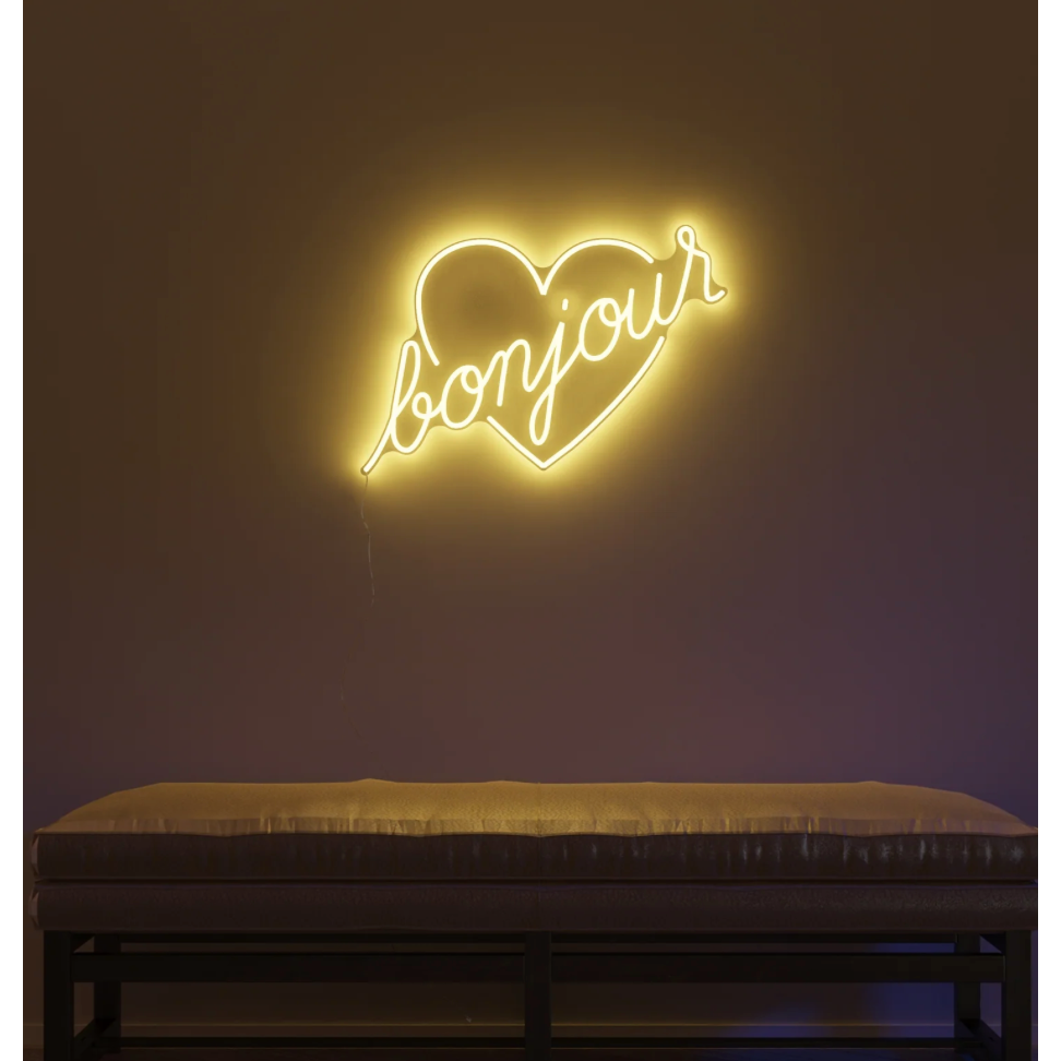 Néon mural "Bonjour" en forme de cœur – Jean André x Yellowpop – lumière jaune