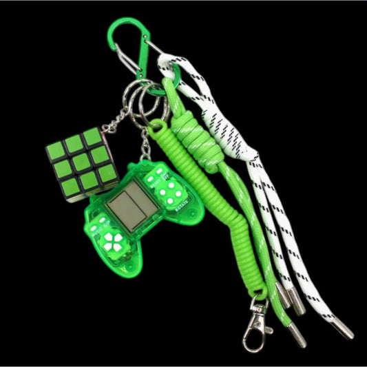 Grigri de sac manette verte avec jeu Tetris et mini cube rotatif – OMM