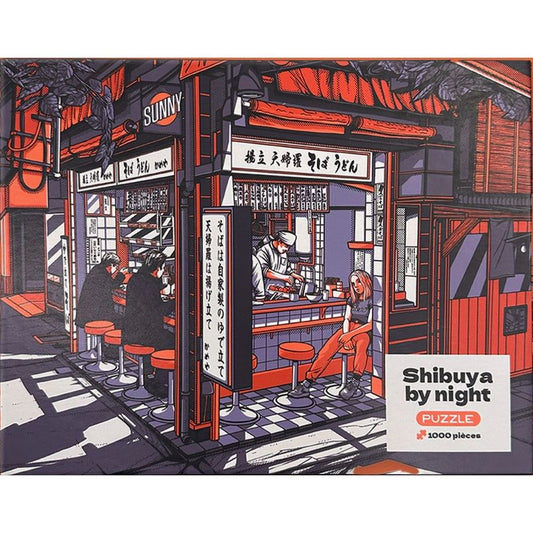 Puzzle "Shibuya by Night" de Paiheme Studio. 1000 pièces d’art urbain japonais inspiré de Tokyo. Couleurs néon, détails sublimes, édition premium.