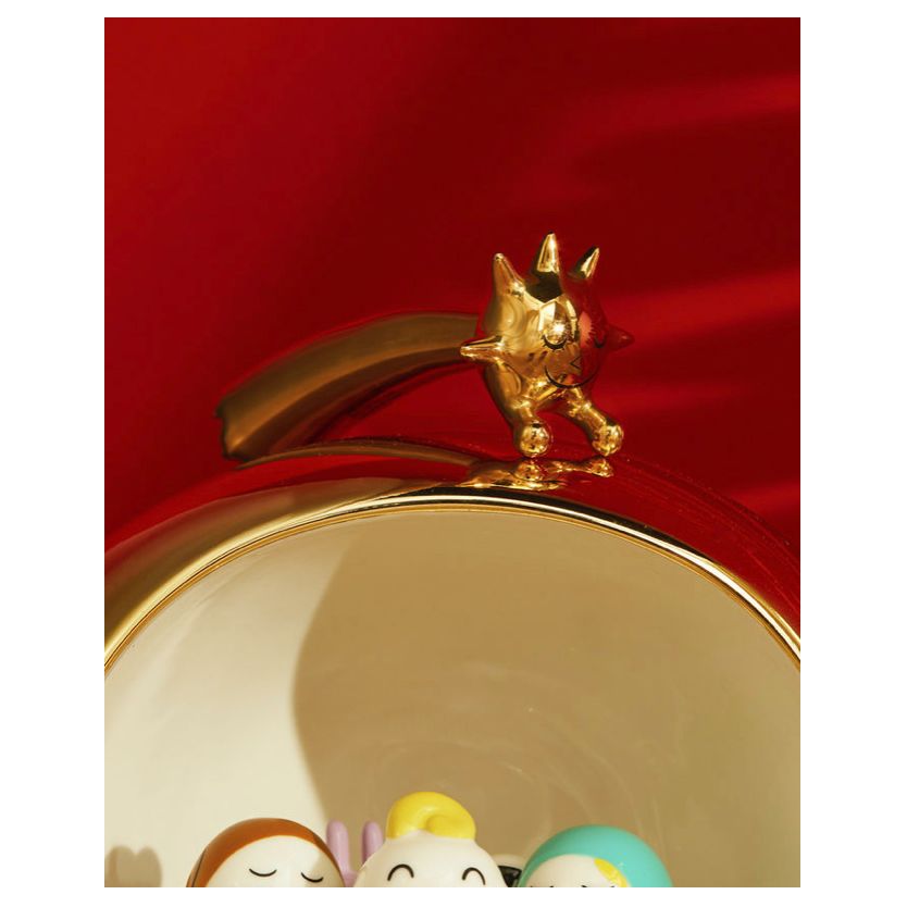 Figurine Alessi "Stella Stellina" – étoile filante en porcelaine dorée, décorée à la main, design Massimo Giacon.