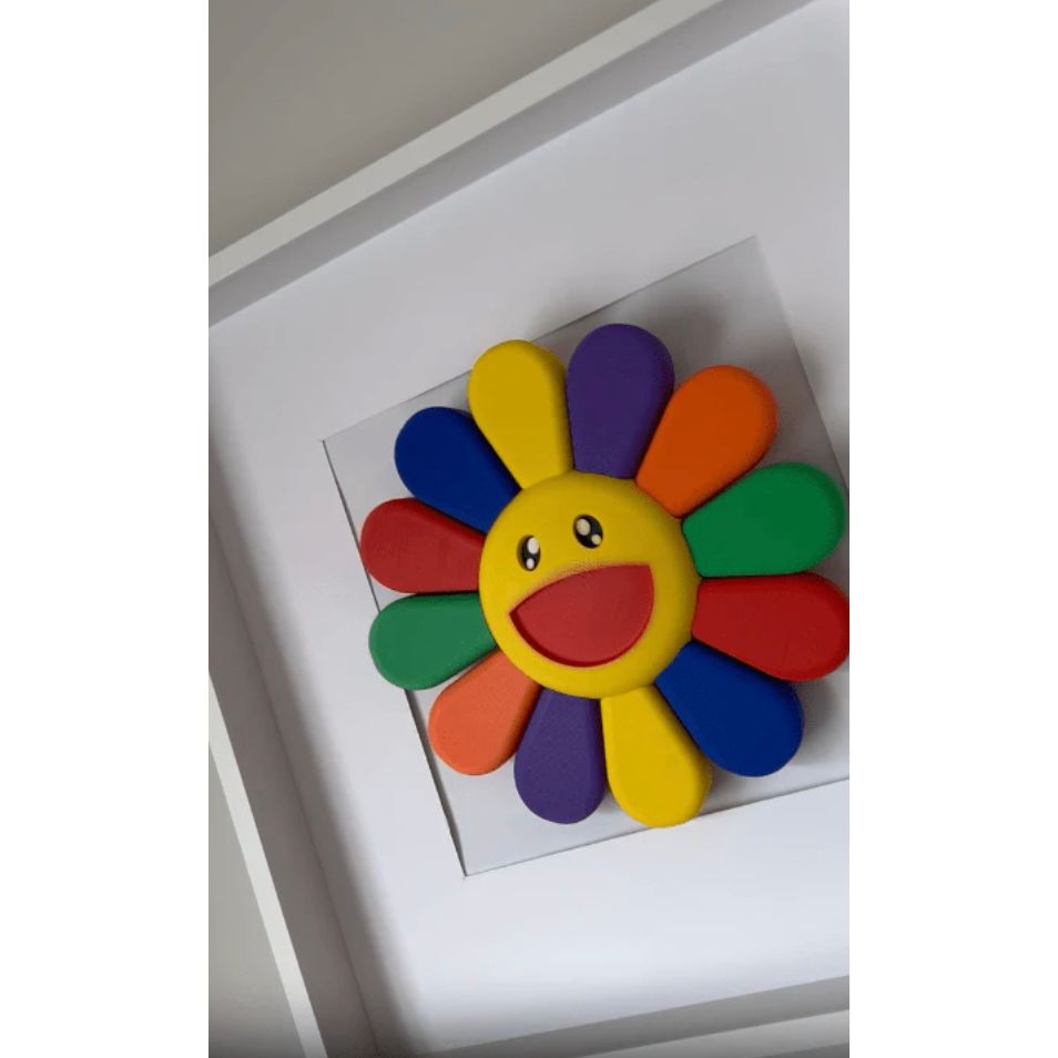 – Fleur Murakami encadrée sculpture murale pop art
– Tableau fleur souriante multicolore style Murakami
– Décoration murale pop art fleur Murakami encadrée