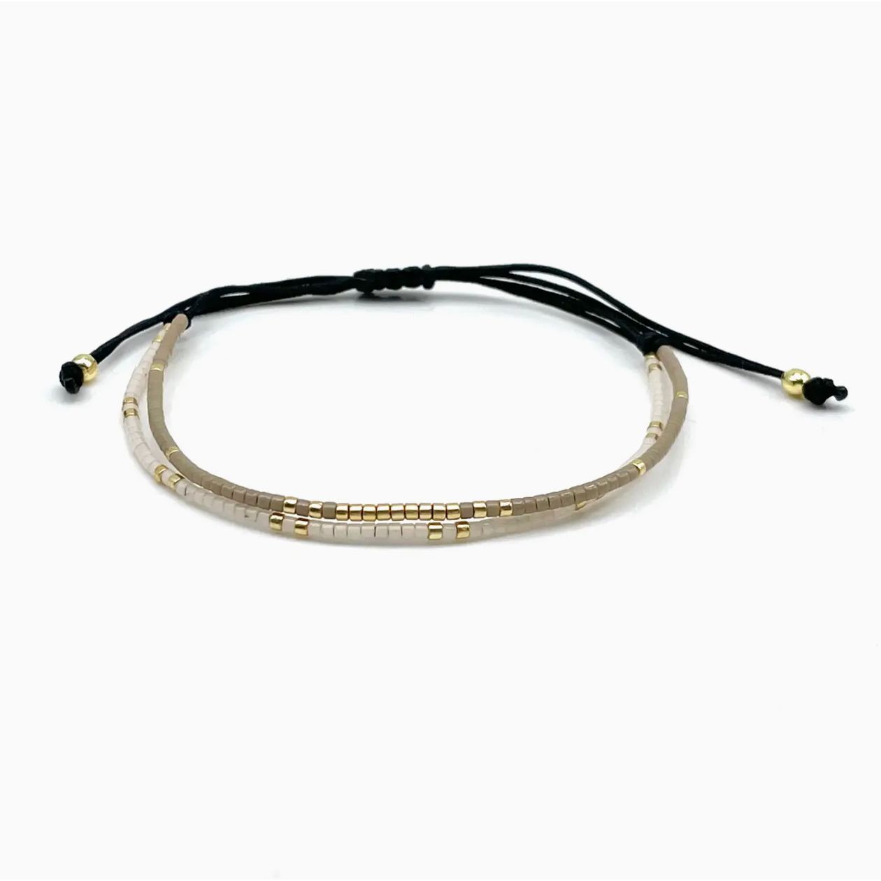 -bracelet valencia miyuki parsley pepper ajustable
-bracelet perles miyuki beige doré bohème chic
-bracelet minimaliste femme perles japonaises miyuki
-bracelet ajustable fabriqué main allemagne parsley pepper