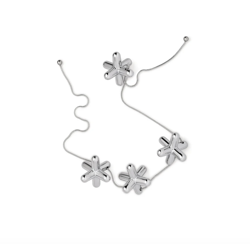 Dessous de plat extensible TRIPOD Alessi en acier inoxydable poli miroir