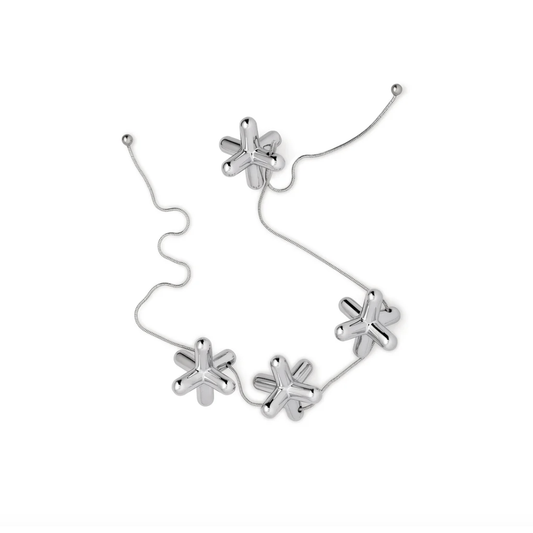 Dessous de plat extensible TRIPOD Alessi en acier inoxydable poli miroir