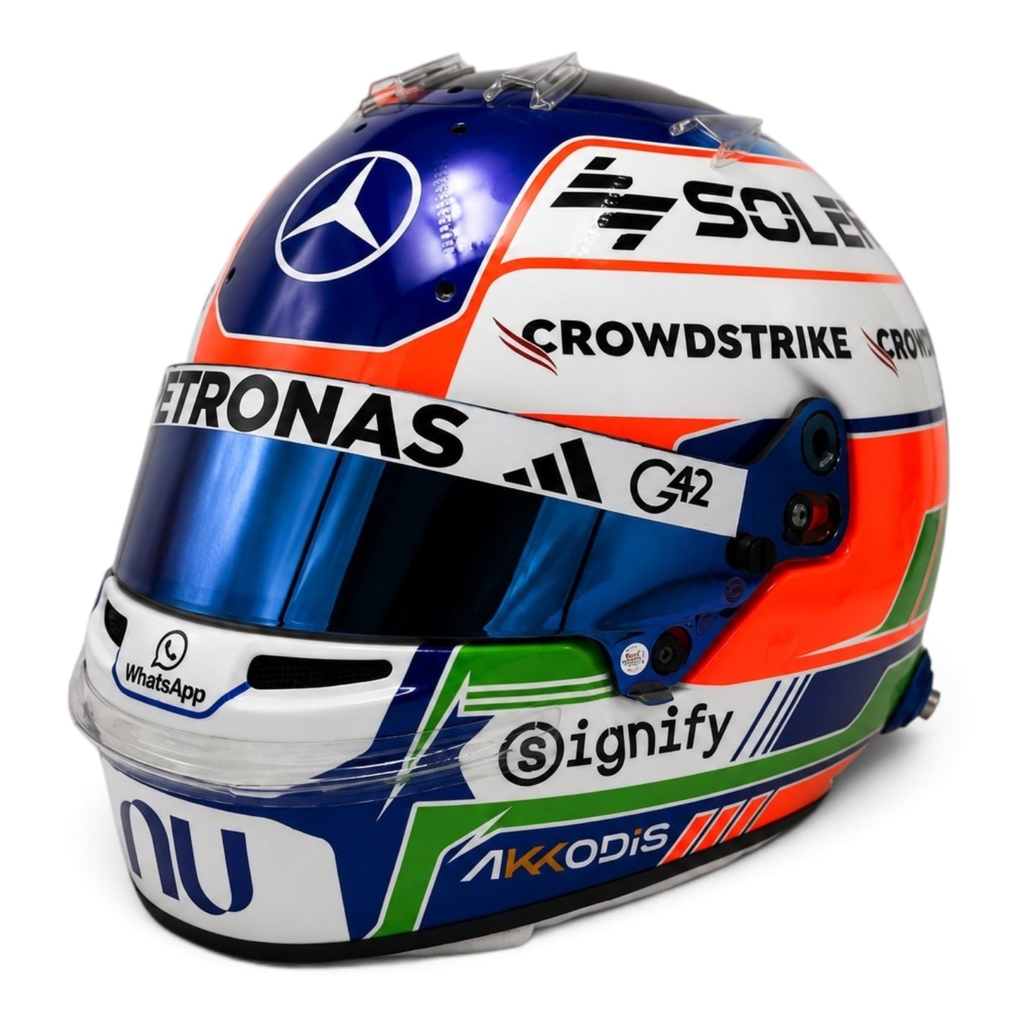 Casque Replica Kimi Antonelli 2026 Mercedes-AMG F1 vu de profil avec livrée orange verte bleue et visière Bell originale